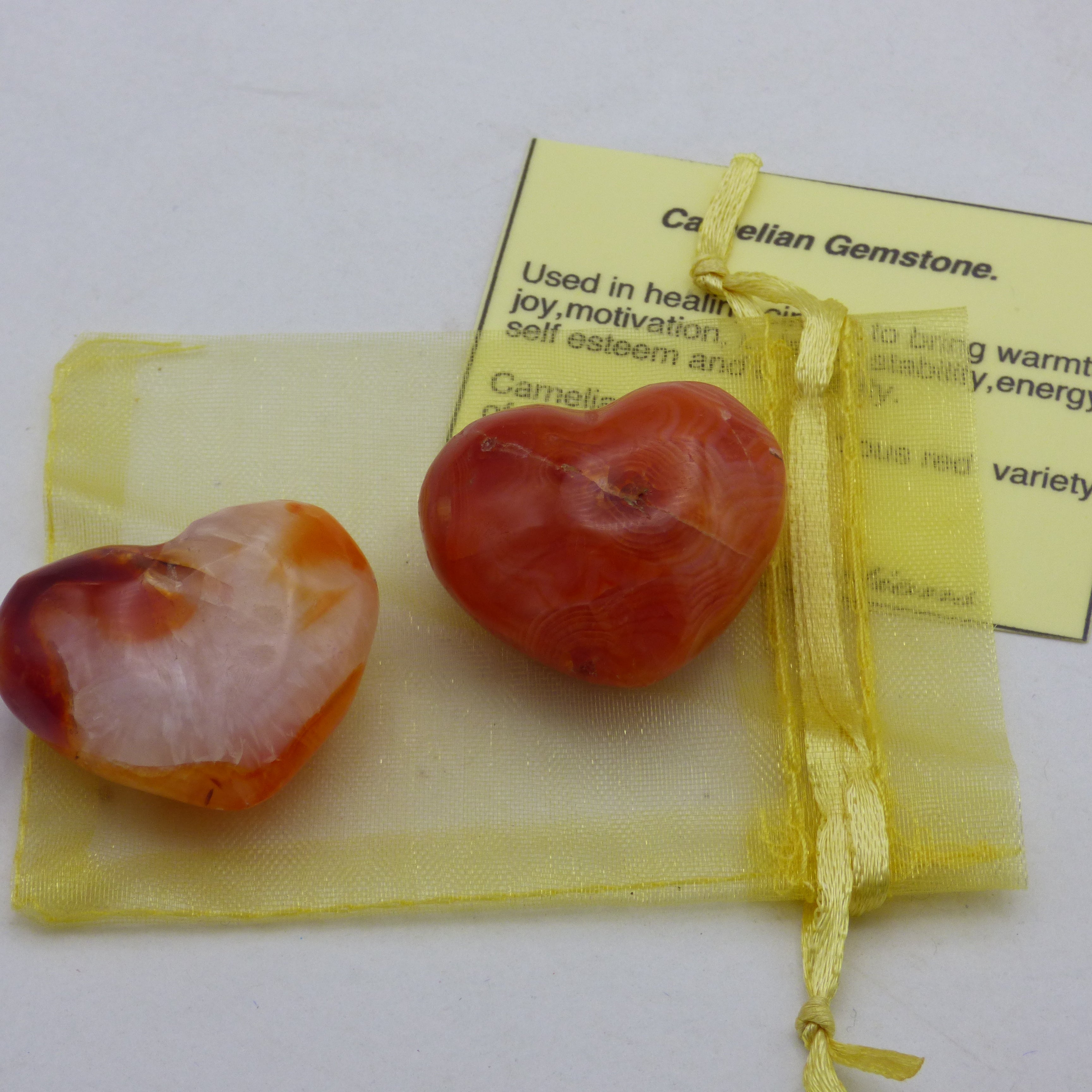 Pair of beautiful tiny red orange carnelian crystal hearts