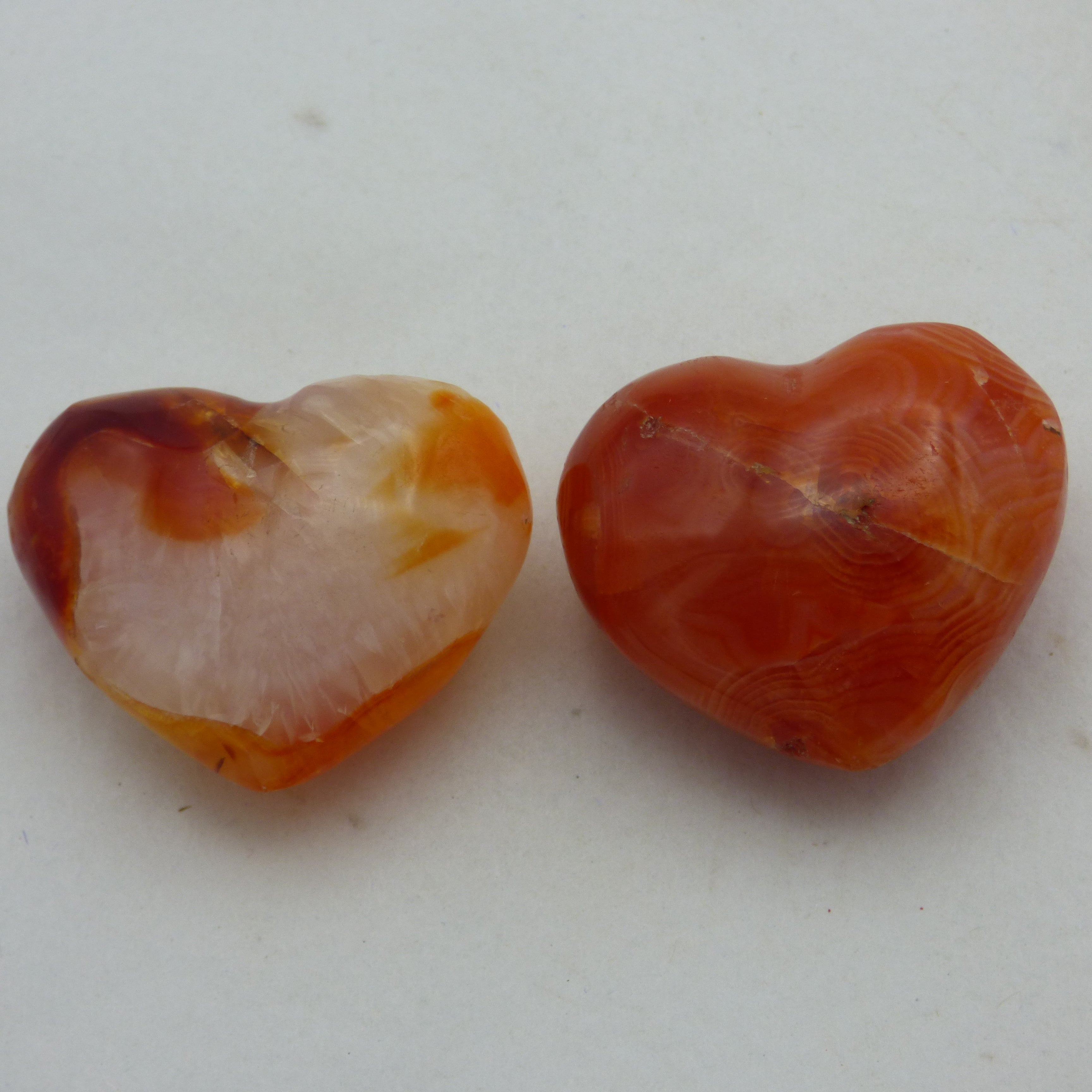Pair of  beautiful tiny red orange carnelian crystal hearts