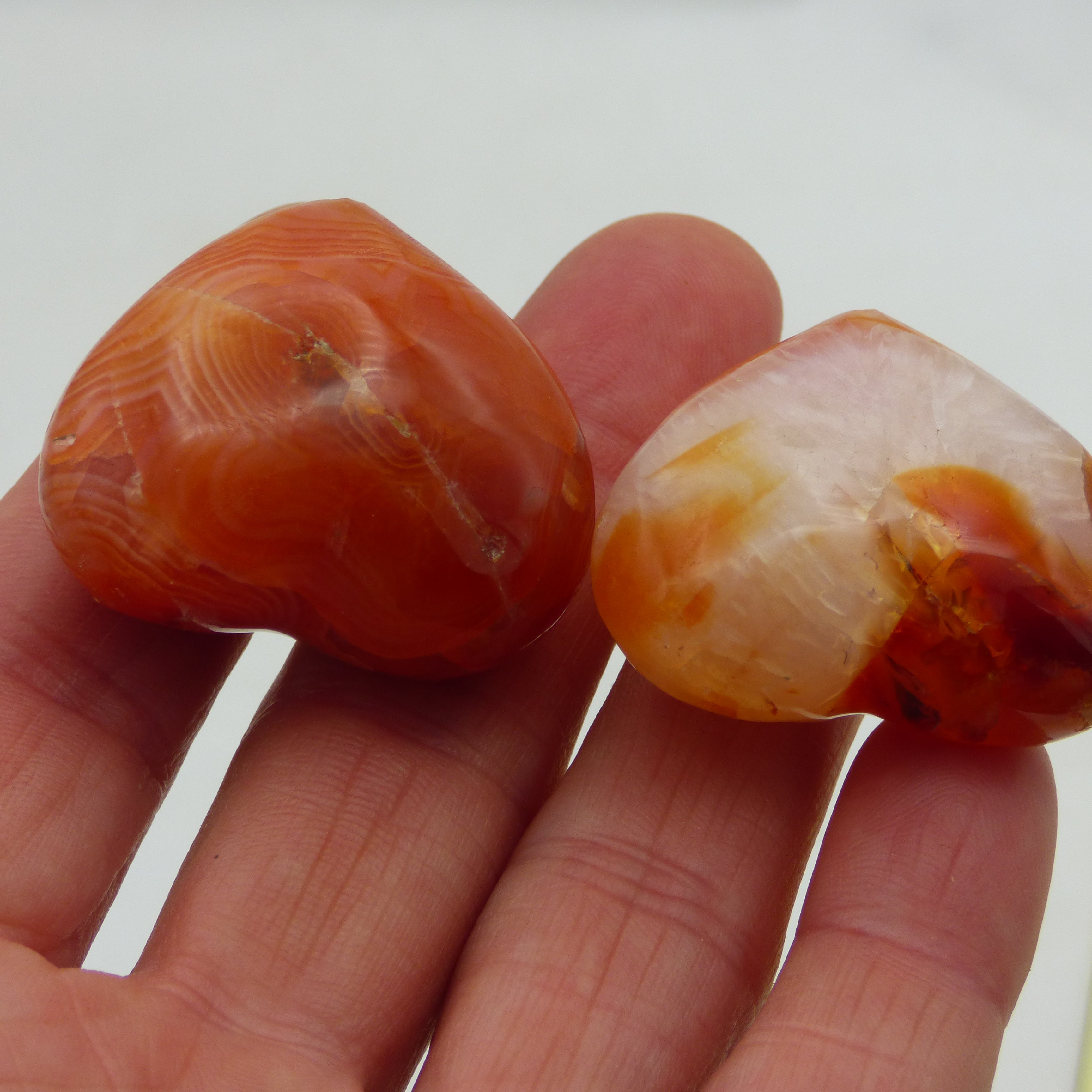 Pair of  beautiful tiny red orange carnelian crystal hearts