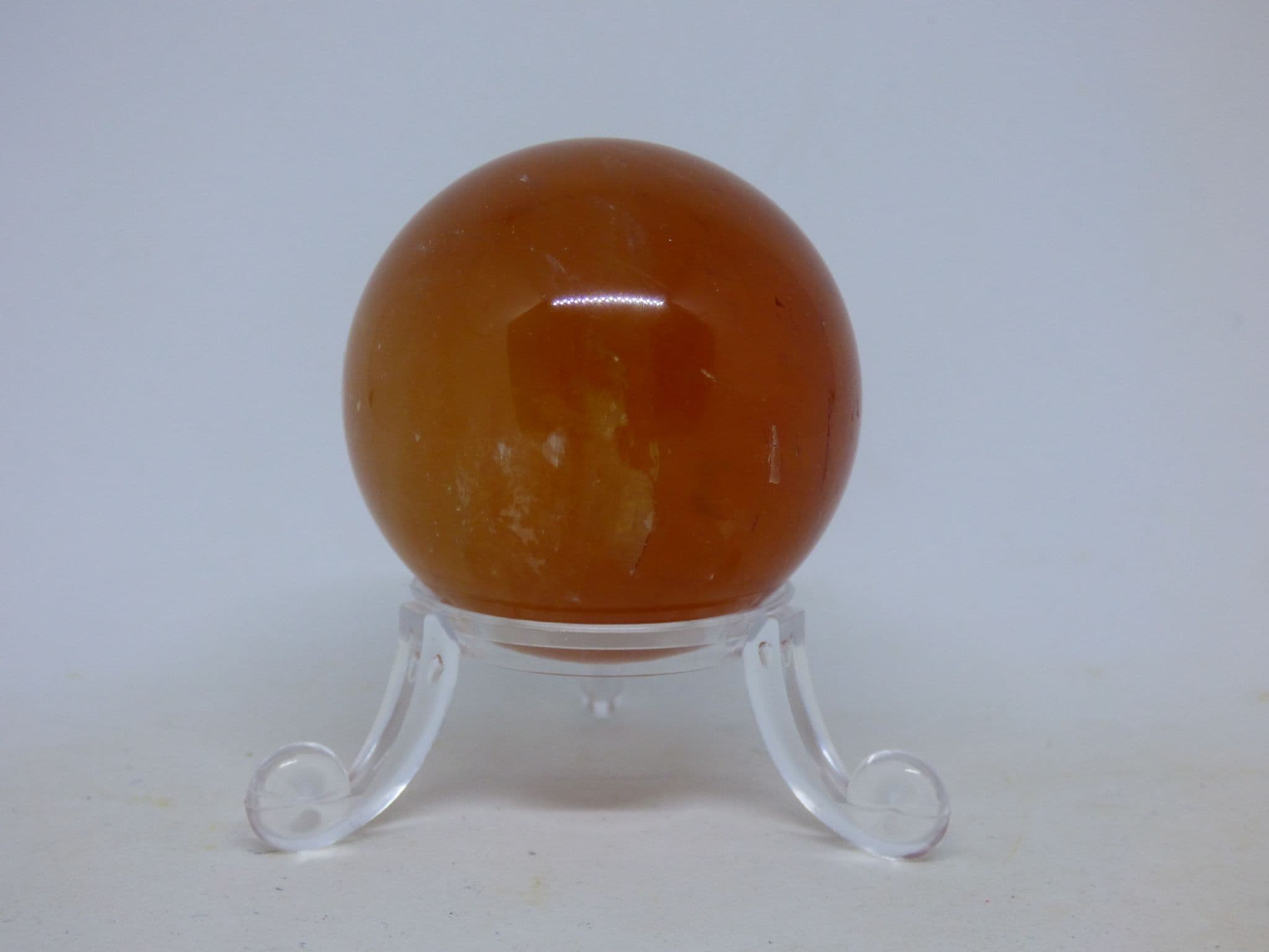 Natural Honey Calcite Optical Crystal Sphere on stand