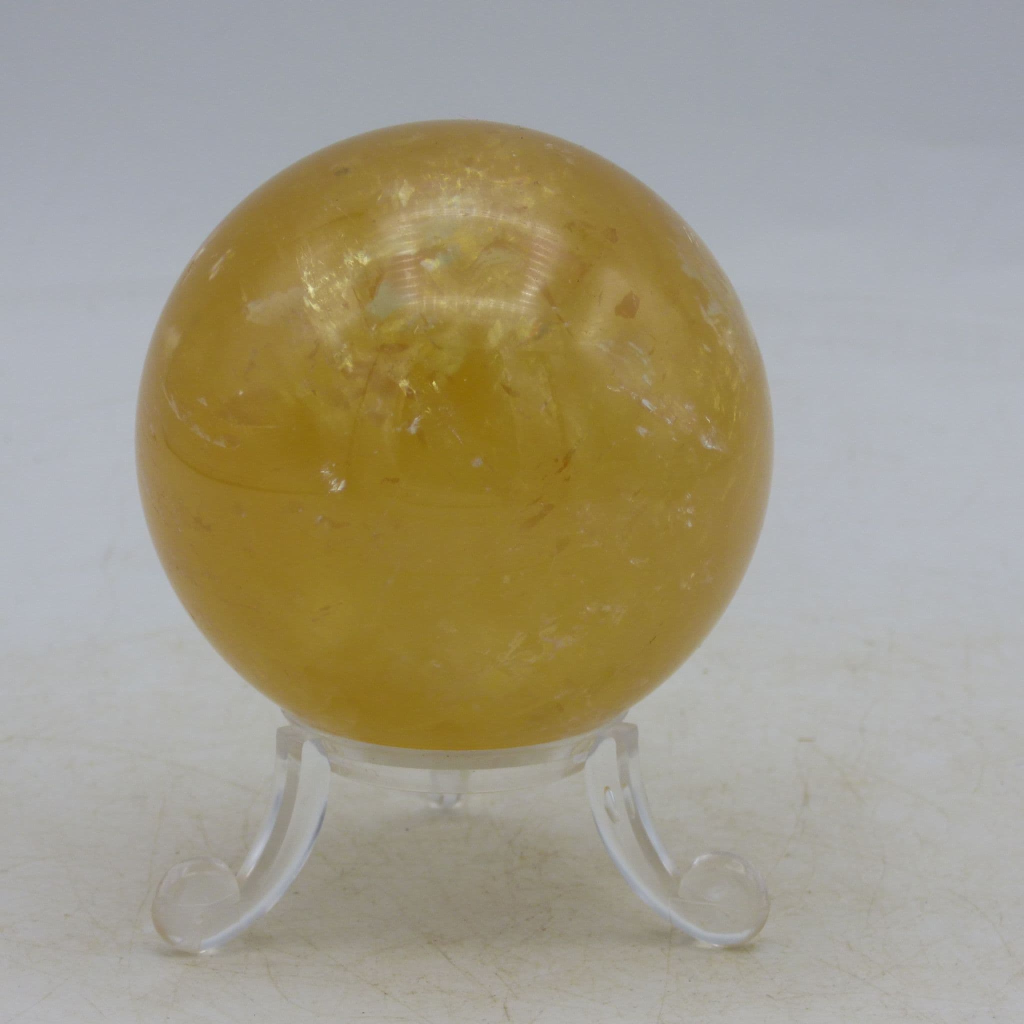 Natural Orange Calcite Crystal Sphere with Stand